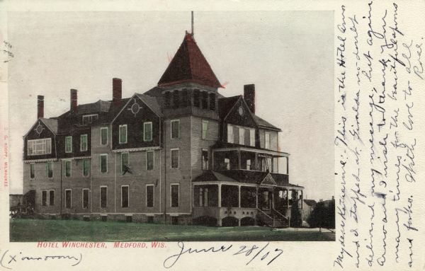 Exterior view of the Hotel Winchester. Caption reads: "Hotel Winchester, Medford, Wis."