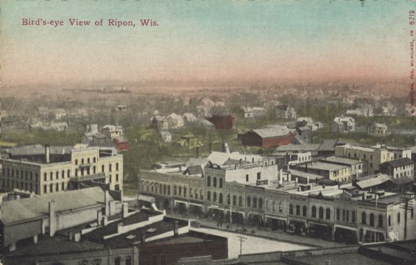 Text on front reads: "Bird's-eye View of Ripon, Wis." View from a tall building over the Public Square with buildings and dwellings of the town spreading out to the horizon.