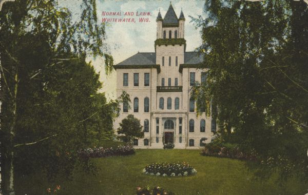 Text on front reads: "Normal and Lawn, Whitewater, Wis." Called "Old Main," this building was built in 1868 and destroyed in a fire in 1970. The garden in front was beautifully landscaped.