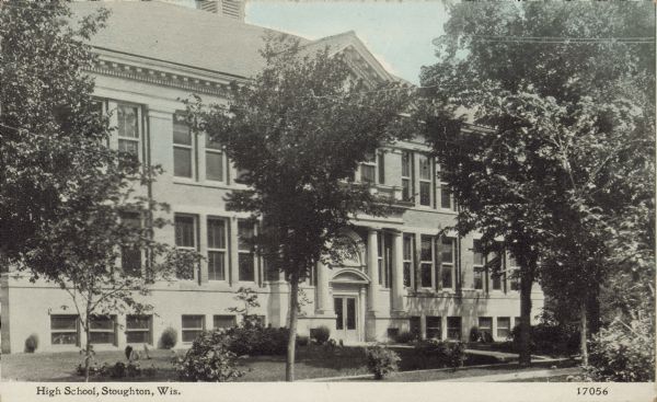 Text on front reads: "High School, Stoughton, Wis." The brick High School was built in 1908 and demolished in 1997.