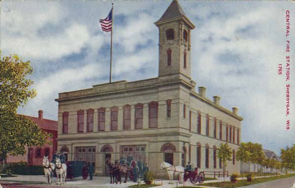 Text on front reads: "Central Fire Station, Sheboygan, Wis." Three horse-drawn vehicles are surrounded by uniformed firemen. There is a dog in the buggy to the right. The firehouse is flying an American Flag.<p>From the Wisconsin Historical Society Property Record: "Begun in 1906 and completed in 1907, this two-story cream brick firehouse has a corner tower and red brick polychromatic architectural trim. The 1959 corner tower cupola and decorative cornice have been removed. Sheboygan County Landmark."</p>