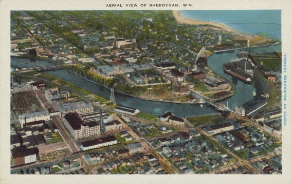 Text on front reads: "Aerial View of Sheboygan, Wis." The image shows the Sheboygan River from Lake Michigan to the Pennsylvania Avenue bridge.