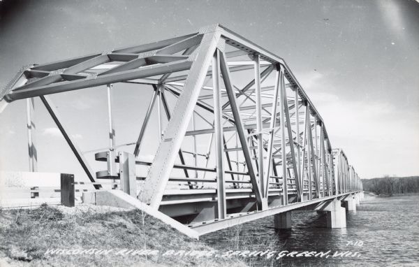 Text on front reads: "Wisconsin River Bridge, Spring Green, Wis." A truss bridge with eight spans over the Wisconsin River on State Highway 14. The bridge was built in 1949 and reconstructed in 1986, then replaced in 2009.
