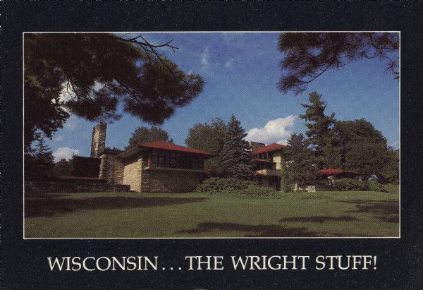 Text on reverse reads: "A State of Art... Wisconsin! <b>Frank Lloyd Wright's Hillside School of Architecture, Spring Green</b> - This world famous architect built his home 'Taliesin' and his school in the beautiful valleys of southwest Wisconsin. Tour his Hillside School and studio and dine nearby in the only restaurant he designed. From Sept. 2 to Nov. 6, 1988, see the unique collection <b>Frank Lloyd Wright and Madison: Six Decades</b> at the Elvehjem Museum of Art in Madison. For a free <b>Wisconsin Vacation Kit,</b> write: Wisconsin Dept. of Development-Tourism, Box 7606, Madison, WI 53707, or call toll-free from Wisconsin or adjoining states <b>1-800-ESCAPES.</b>" Exterior view of the school framed by pine branches.