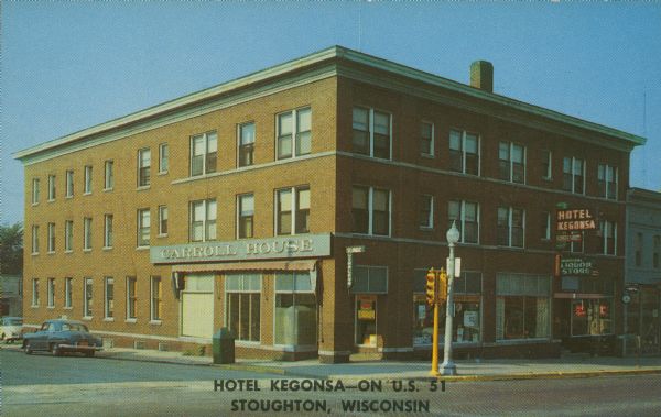 Text on front reads: "Hotel Kegonsa — On U.S. 51, Stoughton, Wisconsin." On reverse, "Hotel Kegonsa, Modern Coffee Shop, U.S. Highway 51, Stoughton, Wisconsin." A brick hotel on a brick paved street with many signs that read: "Carroll House", "Hotel Kegonsa", "Coffee Shop" and "Municipal Liquor Store".<p>From the Wisconsin Historical Society Property Record: "This site has been the location of a hotel since the very beginning of Stoughton's history. The present building was constructed between 1912 and 1926. Community founder Luke Stoughton persuaded Alvin West to establish an inn on this property in 1855. Hotels occupying this site have had a number different names: The Stoughton House, the Mt. Vernon House, The Higbee House, the Hutson House, and the Hotel Kegonsa."</p>