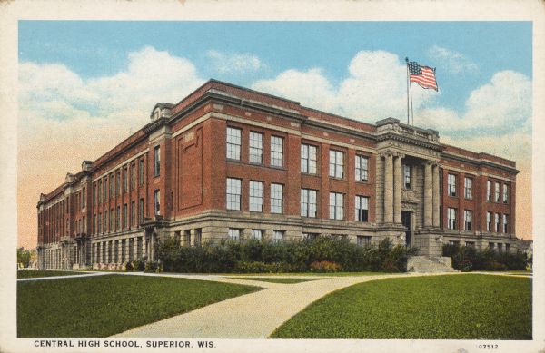 Text on front reads: "Central High School, Superior, Wis." The school was built in 1909 of brick in the Neoclassical style. In 1928, President Coolidge used the High School as his summer office while he was on vacation in the area. Over the years the building was a high school, middle, jr. high and elementary school. It was demolished in 2004.
