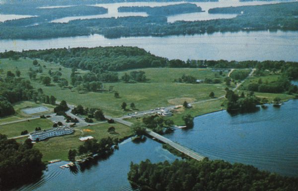 Text on reverse reads: "Northernaire, Three Lakes, WI 54562. Phone 715 – 546-3331. The Resort Hotel that has it all." Aerial view of Northernaire Resort, on Deer Lake. The resort is in the foreground. Many lakes, surrounded by trees, are in the background, including Big Stone Lake, Laurel Lake, and Medicine Lake.
