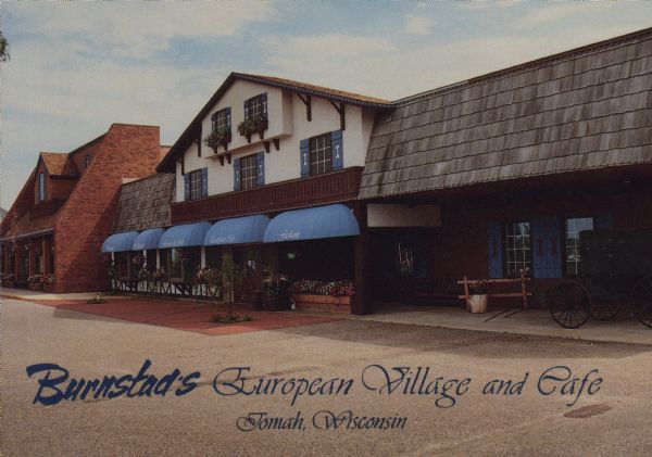 Text on front reads: "Burnstadt's European Village and Cafe, Tomah, Wisconsin." On reverse: "Burnstadt's European Village and Cafe. The warmth of European architecture flavors the many shops and cafe. Fashions, Christmas Shop, Amish goods, Wisconsin Shop, flowers, gifts and souvenirs. Truly 'one of a kind' in the entire Midwest. Hwys. 12 & 16 East, Tomah, Wisconsin." This business opened in 1969 and closed in 2017.