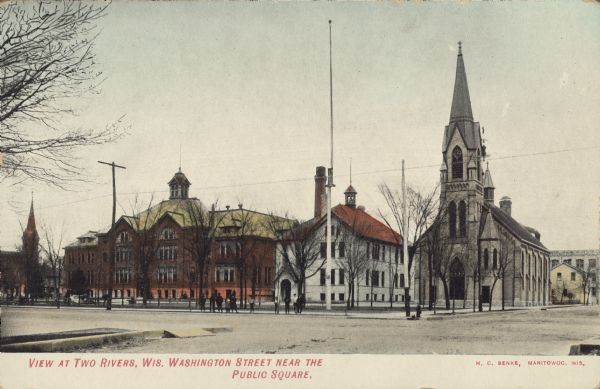 Text on front reads: "View at Two Rivers, Wis. Washington Street Near the Public Square." Buildings on the Public Square, several with steeples. Pedestrians are on the sidewalk.