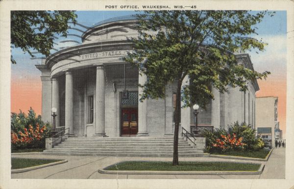 Text on front reads: "Post Office, Waukesha, Wis." Built in 1913 of Bedford Limestone in the Neoclassical style. It has an impressive portico, supported by six Doric columns, and a copper and stained glass dome. It served as the Post Office from 1914 until 1962, then became the First National Bank of Waukesha. In 2001 it opened as a meeting and banquet facility and as of 2022, it is called The Rotunda, a wedding venue.