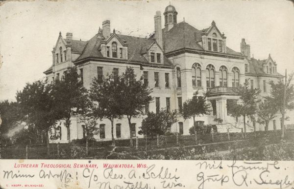Text on front reads: "Lutheran Theological Seminary, Wauwatosa, Wis." The two-story building with a full basement and a large attic was dedicated in 1893. Due to increased enrollment, the seminary was moved to Mequon in 1929.