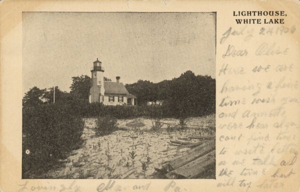 Caption reads: "Lighthouse, White Lake." This lighthouse is located in Whitehall, Michigan, between Lake Michigan and White Lake. It was built in 1875 and became a museum in 1970.