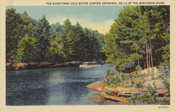 Text on front reads: "The River from Cold Water Canyon Entrance, Dells of the Wisconsin River." An excursion boat seen from entrance to Cold Water Canyon. Rock formations and trees line the shore.