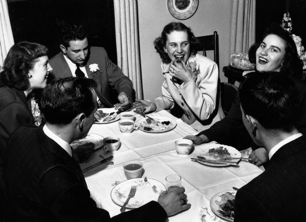 The wedding party relaxes at Krueger's Hotel after the wedding. Seated clockwise starting at lower left — Gerald Liechtle, Betty Dreymiller, the Groom, the Bride, Betty Leichtle and Jack Dreymiller.