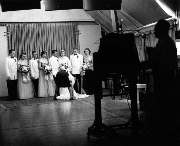 Lamers-Frank wedding party is photographed at the Docter photographic studio.
