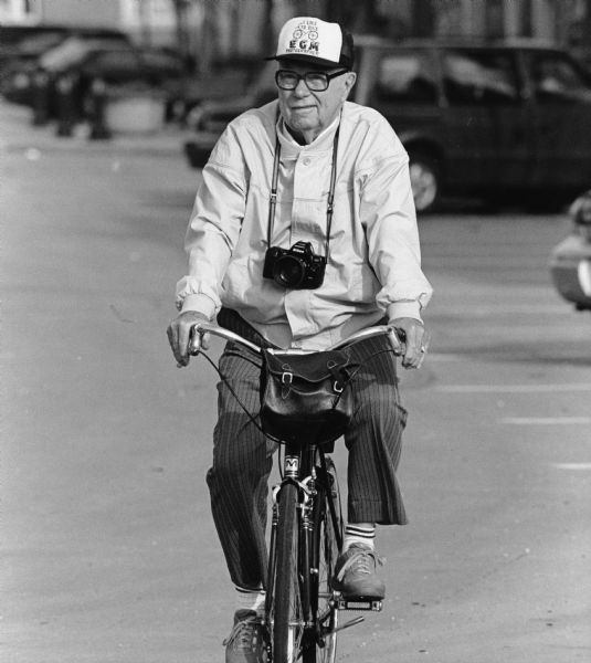 Edgar Mueller rides his bicycle down the streets of Mayville.