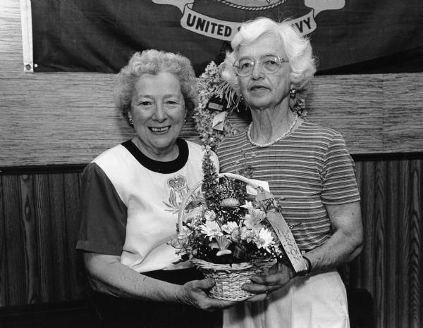 Evangeline Koll, pictured right, is named Theresa Citizen of the Year for 2000. She's feted at Mark's Get-A-Way on Wednesday, July 26. Evangeline, nominated for the same award by Arlene Beck, is pictured on the left.