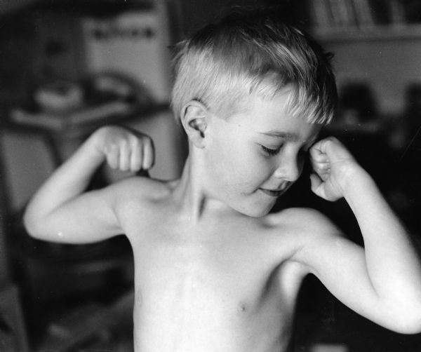 Photograph of Chase Lindgren taken by his mother, Kandy Lindgren. Photo won first prize in the black and white division of the "Milwaukee Journal Sentinel's" photo contest in 2003.