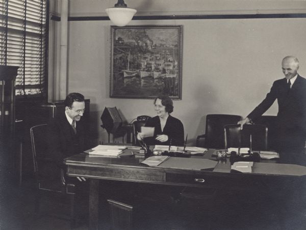 Arthur Altmeyer, Ellen Woodward and George Bigge in an early meeting of the Social Security Board.
