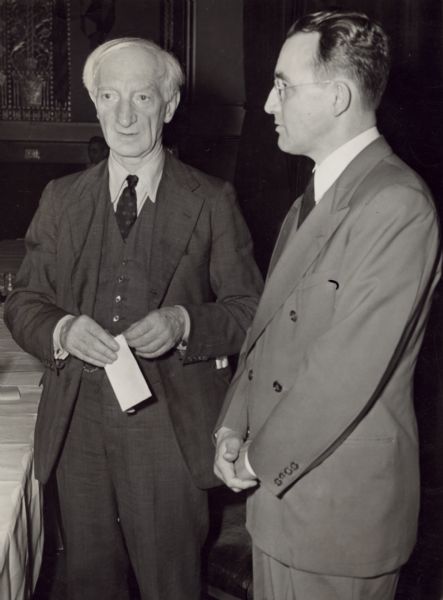 From left to right: Sir William Beveridge, author of the British "Cradle to the Grave" social security plan, and Arthur J. Altmeyer, Chairman of the Social Security Board.