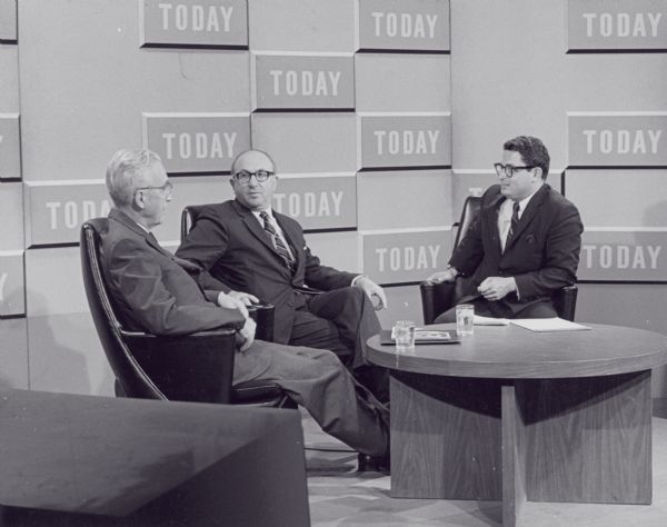 Arthur Altmeyer and Wilbur Cohen on the set of the "Today" show, talking about the 33rd anniversary of the Social Security bill.
