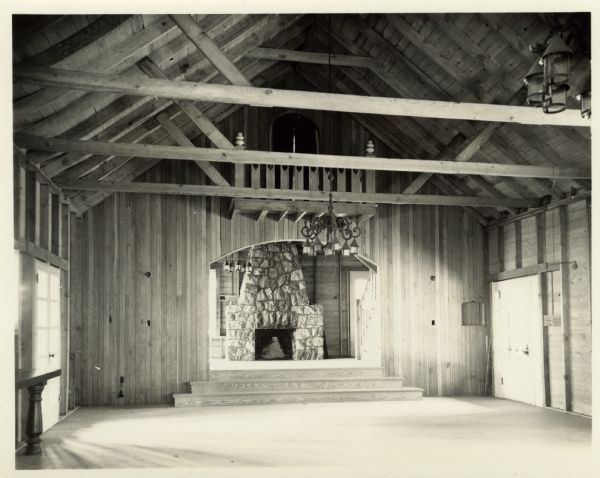 An interior view of the shelter house in Terry Andrae Park, including a stone fireplace. Terry Andrae is one part of the Kohler-Andrae Park system.

