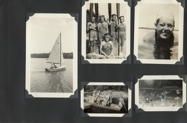 Page from Joy Camps photo album displaying five photographs. On the left is a Snipe setting sail with a camper and Miss Camp aboard. The top middle photograph shows campers in swimsuits standing on a dock, holding oars; original caption notes: One of the cabin crews ready for a race. Notice the "home-made" suits." The top right photograph is a close-up of a swimmer in the water wearing a swimming cap. The lower right photograph shows a number of campers in the water, jumping, with arms raised; a canoe is in the background, stowed on the shore. The lower middle photograph shows camp counselors in a rowboat; original caption notes: "The counselors crew pushing off in anything but correct form to meet camper crews. Their suits are of burlap bags, their humor infectious!"