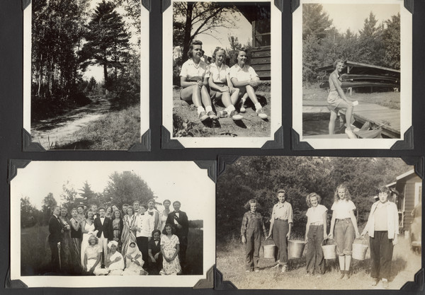 Page from Joy Camps photo album displaying five photographs. For one photograph the original captions notes: "The old, original road along the Lake which now serves the Camp only. A very interesting old tree which we all love." Two other photographss, with counselors seated on the ground next to a building in one and a counselor standing on a dock with one foot on a boat in the other, are described by the original caption: "The three leaders of Cabin IV in 1939, and one of the counselors of Cabin V. These four leaders are typical of our counselor staff." One photograph shows a group of campers in costume; the original caption notes: "The outstanding social event of the 1939 season--the large and important party given by President and Mrs. Roosevelt (with the assistance of Cabin I) for the Duke and Duchess of Windsor. Notables from all over the world attended this very swanky affair." A final group portrait shows several campers lined up, each holding a metal pail; the original caption notes: "Members of the Camp Craft Committee on their way to a barbecue with the liquid refreshment for the event."