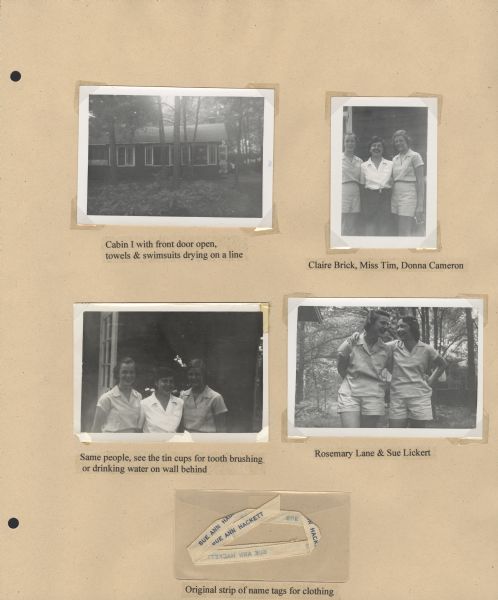 Page from Sue Ann Hackett Blue Album displaying several photographs and name tags for clothing. Includes one of the cabins (exterior view), and some of Sue Ann's friends at camp and one of the camp counselors, all posed in outdoor settings. The name tag is a thin strip of off-white fabric with Sue Ann's name in blue lettering, stored in a small, transparent plastic envelope.