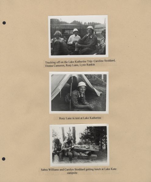 Page from Sue Ann Hackett Blue Album displaying three photographs from the Lake Katherine trip. Includes photographs of campers seated in the back of a truck, a camper posing in a tent, and campers sitting at a picnic table with utensils, with a lake in the background.