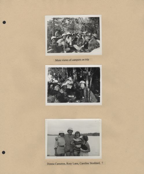 Page from Sue Ann Hackett Blue Album displaying three photographs from the Lake Katherine trip. Includes campers grouped around a campsite, some sitting in the foreground (with utensils) and others standing in the background, and a group portrait of four campers posed alongside a lake, with distant shoreline in the background. Many of the campers are wearing hats.