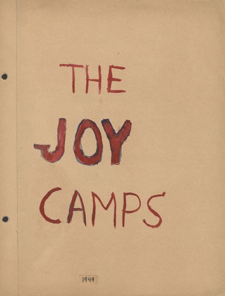 Page from Sue Ann Hackett Scrapbook displaying title page. The text reads: "THE JOY CAMPS." The lettering is hand-drawn with red paint, and some of the letters are outlined in blue. The year "1949" has been included in smaller writing below the title.