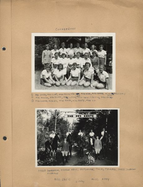 Page from Sue Ann Hackett Scrapbook displaying two photographs. The top is a group portrait of the counselors who worked at Joy Camps in the summer of 1949, and includes the co-directors Miss Camp and Miss Joy. The group was posed near a camp building. The other shows several campers on horseback, two counselors in full riding gear, and a Dalmatian dog, all posed just outside the main entrance to the camp. The camp entrance is marked with a sign that reads "The Joy Camps," which hangs off of a birch log entryway above a dirt trail. The captions are handwritten in blue ink.