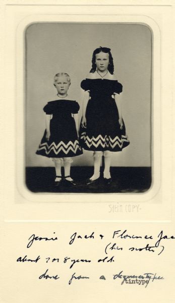 Copy print of a tintype portrait of sisters Jessie and Florence Jack. Jessie is about 7 or 8 years old. The girls wear matching dresses.