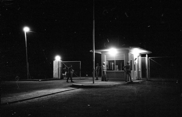 Night view of the northeast gate of the U.S. base at Guantanamo.