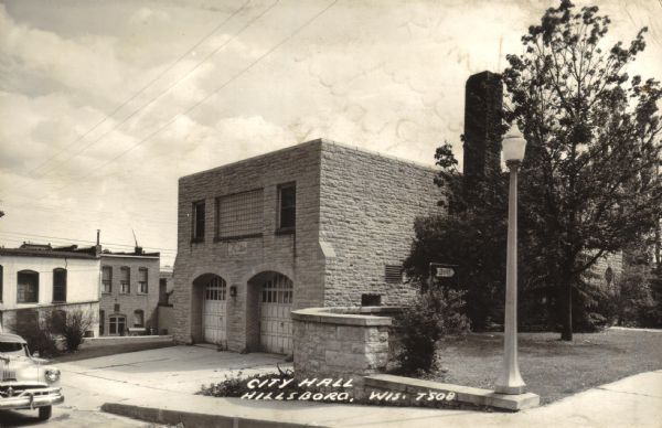 Exterior view from street of Hillsboro's City Hall. It was constructed in 1937 with assistance from a Works Progress Administration (WPA) project. The lower level housed the Fire Department for many years, and the upper level served as a Public Library and City offices.