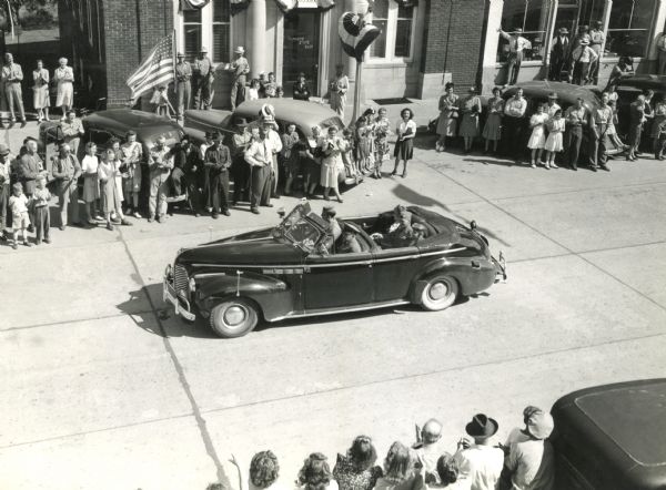 Elevated view of Vice Admiral Marc Mitscher's car in a parade held in his honor. Hillsboro planned the celebration to commemorate the first time in ten years that the military commander visited his birth place.
Local and state newspapers covered the event.
