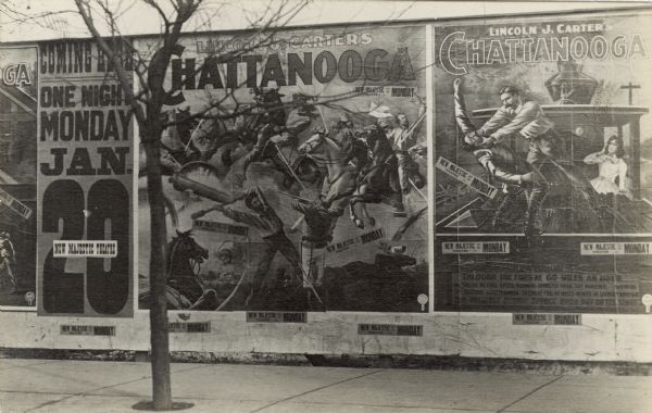 View from the street of a billboard wall along a sidewalk, advertising Lincoln J. Carter's melodrama play, "Chattanooga." It is playing one night, January 20, 1902 at the New Majestic Theater in Milwaukee.