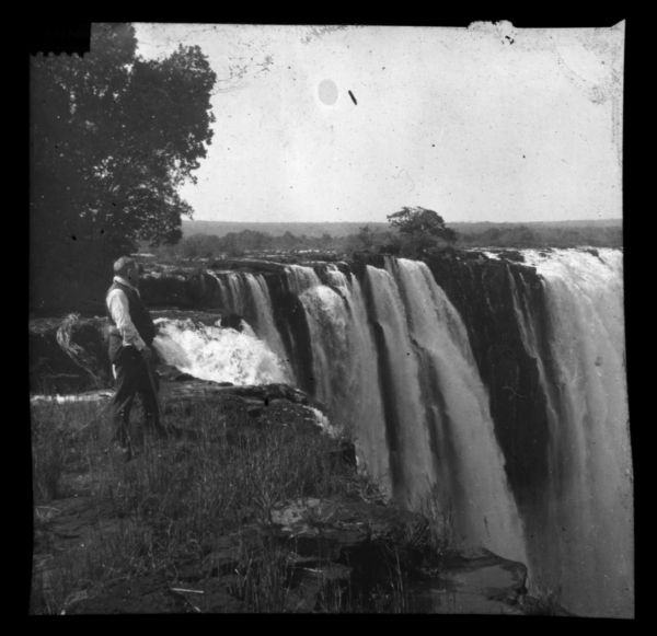 Doctor Thorne was one of the members of Carrie's travel party. He is pictured here, in front of Victoria Falls on Livingstone Island.