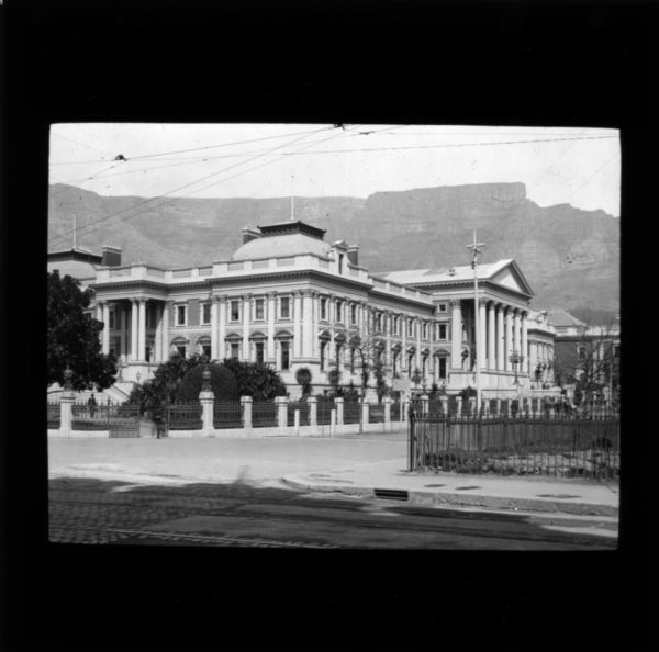 External view of the Parliament house in Cape Town, South Africa. In the background are mountains.