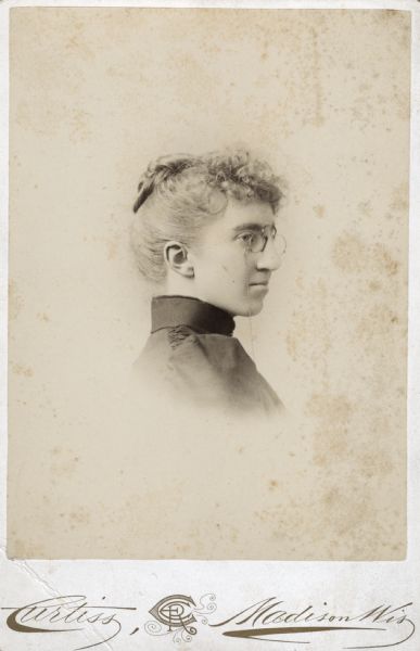 Head and shoulders semi-profile studio portrait of Blanchard Harper.