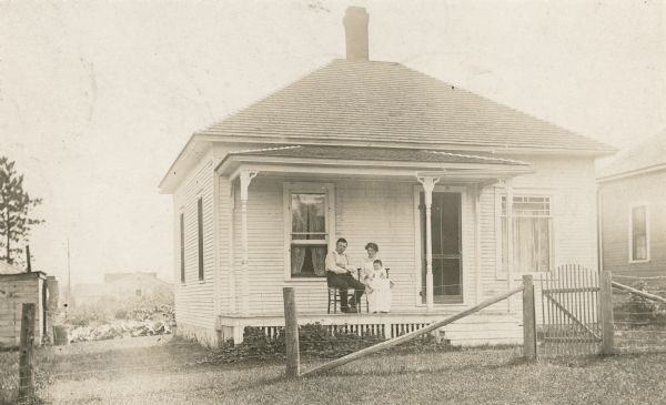 View of front porch of the first parsonage occupied by the Reverend Mr. Row.