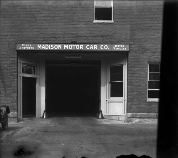 View from street of entrance to the Madison Motor Company, which sold Dodge Brothers automobiles from about 1916, and was located at 325 W. Gorham Street. In 1928 the Madison Motor Company was acquired by Chrysler, but continued to manufacture, sell and service Dodge automobiles. The Dodge Brothers Madison Motor Company was a major competitor to Louis Schoelkopf's Ford dealership. The president of Madison Motor Company was Frank M. Wootton.