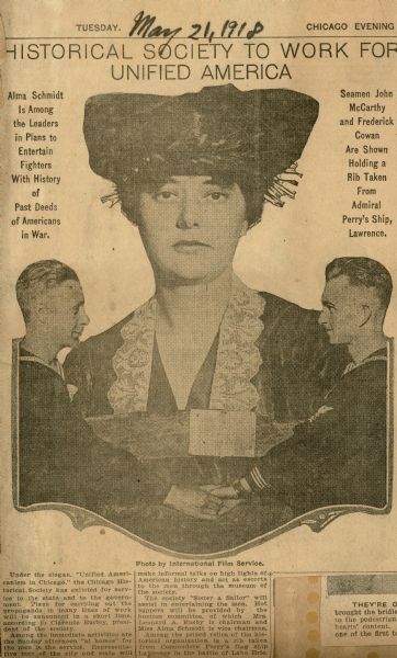 A newspaper article in the "Chicago Evening American" describes "propaganda" plans of the Chicago Historical Society during World War I and prominently features a portrait of Alma Schmidt. Schmidt, the granddaughter of Conrad Seipp and daughter of Dr. Otto Schmidt, was vice-chairman of the hostess committee. Dr. Schmidt was a trustee of the Chicago Historical Society. The committee planned Sunday programs on American history, and hot meals for members of the armed forces.