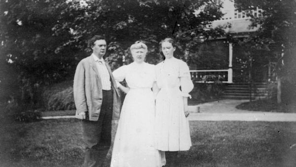 Dr. Otto Schmidt, left, poses with his mother-in-law, Catherine Seipp, and his daughter Alma on the lawn in front of the main house at Black Point.  Catherine was the widow of Conrad Seipp, Chicago brewer and builder the house at Black Point.  Alma and her future husband, Dr. William F. Petersen, would become owners of Black Point.