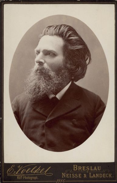 Quarter-length oval-framed studio portrait of Hungarian-born actor Alexander Strakosch (1845-1909). Following his noted acting career, Strakosch was a professor at the University of Vienna.