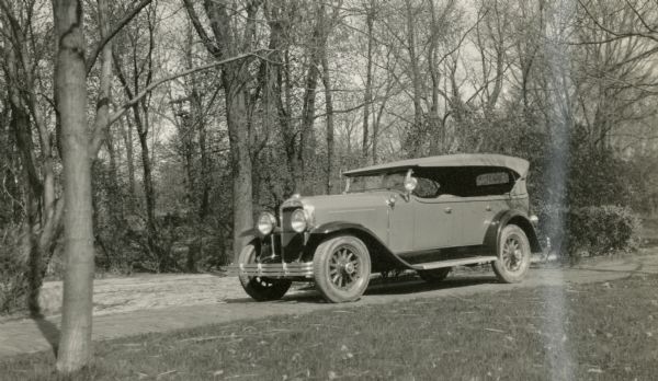 A caption for this photograph written by Ernst Schmidt reads, "1929 7-passenger Buick touring car purchased on May 1 for use at the place on the loop at Black Point." The "loop" is the brick paved driveway at the main house on the estate.