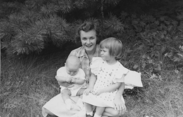 Zika Bakieff Petersen, center, poses with her two children, Edward and Catherine, on the lawn at Black Point in late summer. The children were members of the fifth generation of the Conrad Seipp family to enjoy time at Black Point.