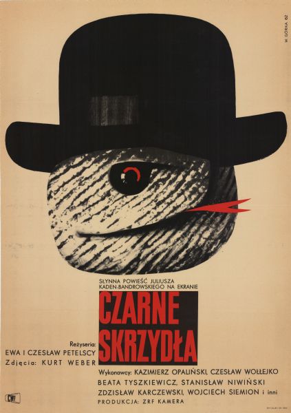 Polish film poster. Illustrated image of a snake's face with one eye and its tongue sticking out. The snake wears a black hat.