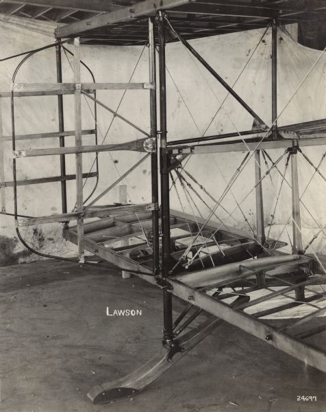 Close-up view of the tail assembly (empennage) of a Lawson Air Liner, with the fins and tail skid attached.